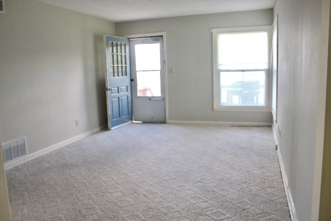 property at 211 E 11th St