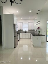 505 E 8th St in Lehigh Acres, FL - Foto de edificio - Building Photo