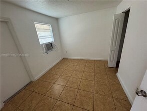 1306 NW 61st St-Unit -7 in Miami, FL - Building Photo - Building Photo