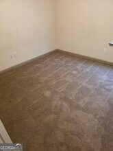 7016 Hollow Oak Ct in Rex, GA - Building Photo - Building Photo