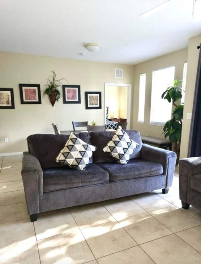 5251 Cane Island Loop in Kissimmee, FL - Building Photo - Building Photo