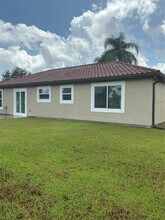 1487 SW Leisure Ln in Port St. Lucie, FL - Building Photo - Building Photo