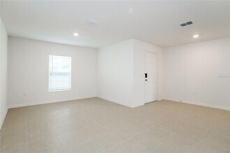 1674 Hideaway Flat St in Mascotte, FL - Building Photo - Building Photo