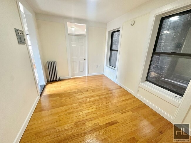 229-231-231 E 12th St