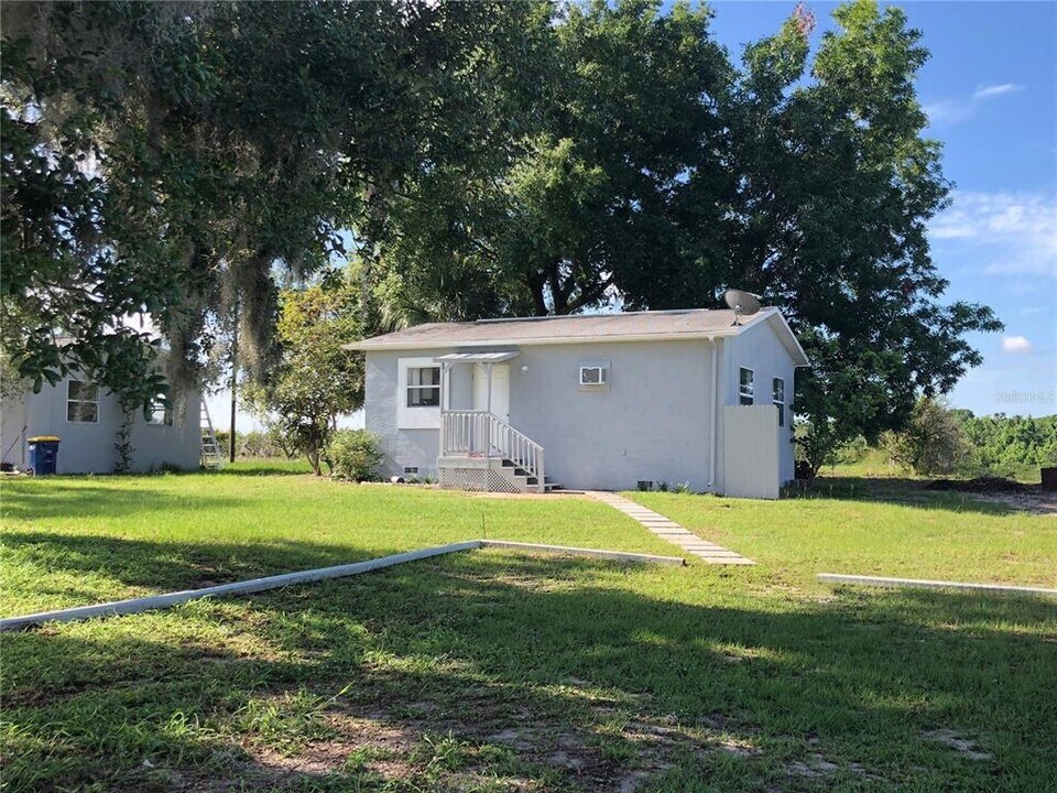 12838 Florida Ave in Astatula, FL - Building Photo