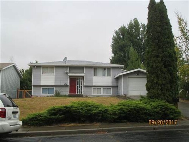 property at 230 NW Robert St