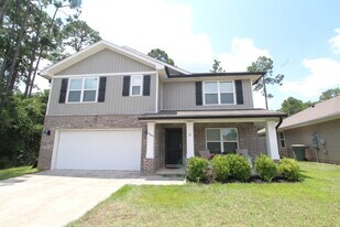 10589 Queens Gate Cir in Pensacola, FL - Building Photo