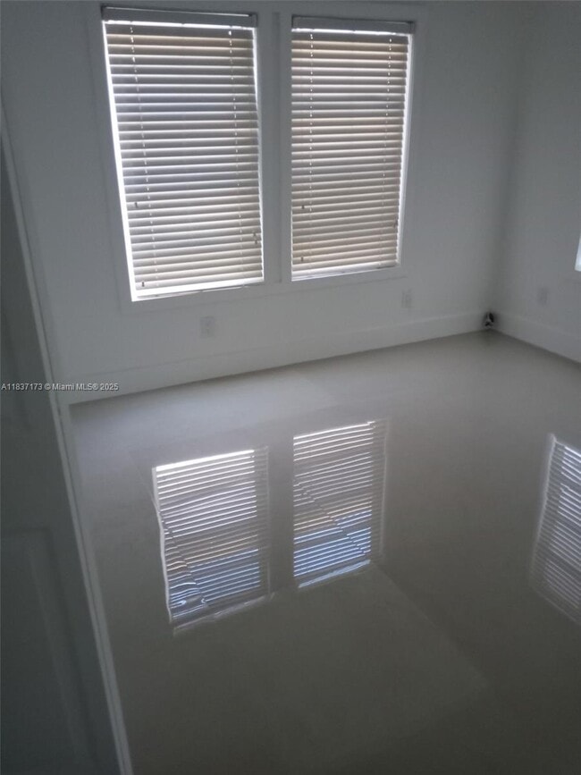 property at 249 E 3rd St