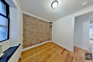 East 100th Street, Unit 1A in New York, NY - Building Photo - Building Photo