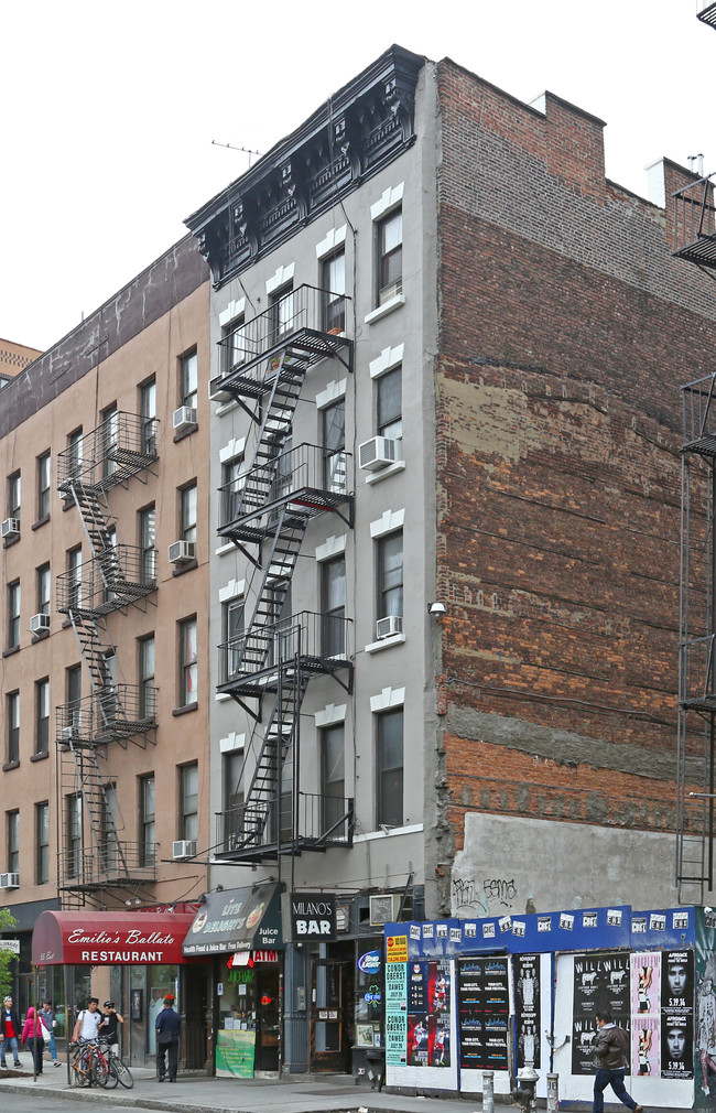 51 E Houston St in New York, NY - Building Photo - Building Photo