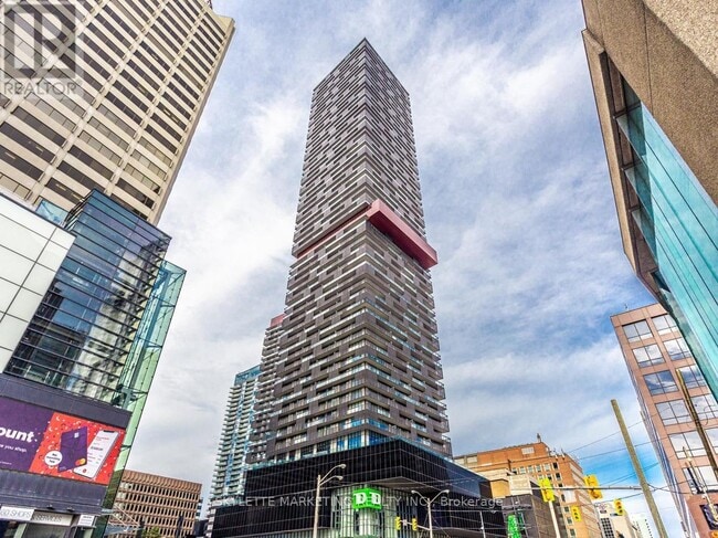 property at 8 Eglinton Ave E