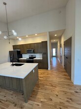 108-110 Amberwood Ct in Raymore, MO - Building Photo - Building Photo