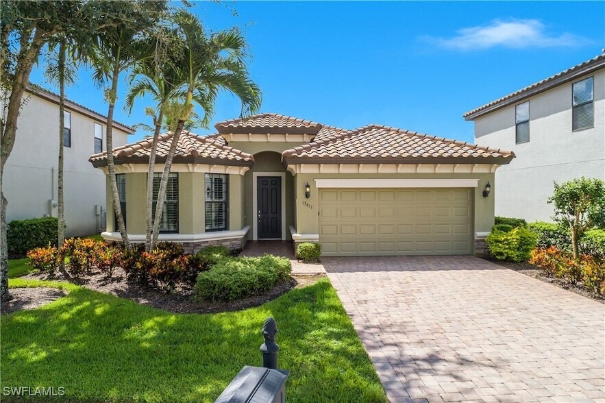 13611 Villa Di Preserve Ln in Estero, FL - Building Photo