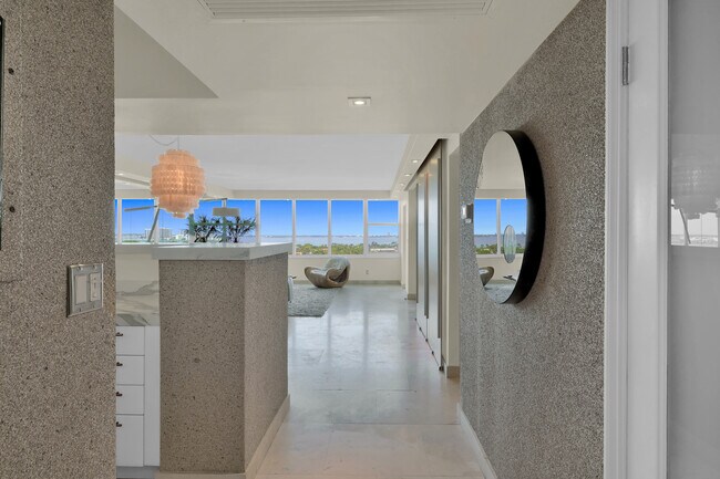 property at 5600 Collins Ave