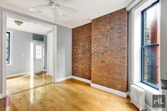 Mott Street, Unit 16 in New York, NY - Building Photo - Building Photo