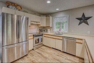 55 Mountain River Ave, Unit uniit 24 in Thornton, NH - Foto de edificio - Building Photo