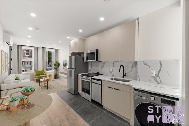 property at 72-50 66th St