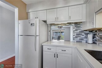 2111 NE 42nd Ct-Unit -207 in Lighthouse Point, FL - Building Photo - Building Photo