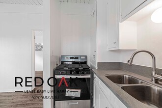 128 Normandie Ave in Los Angeles, CA - Building Photo - Building Photo