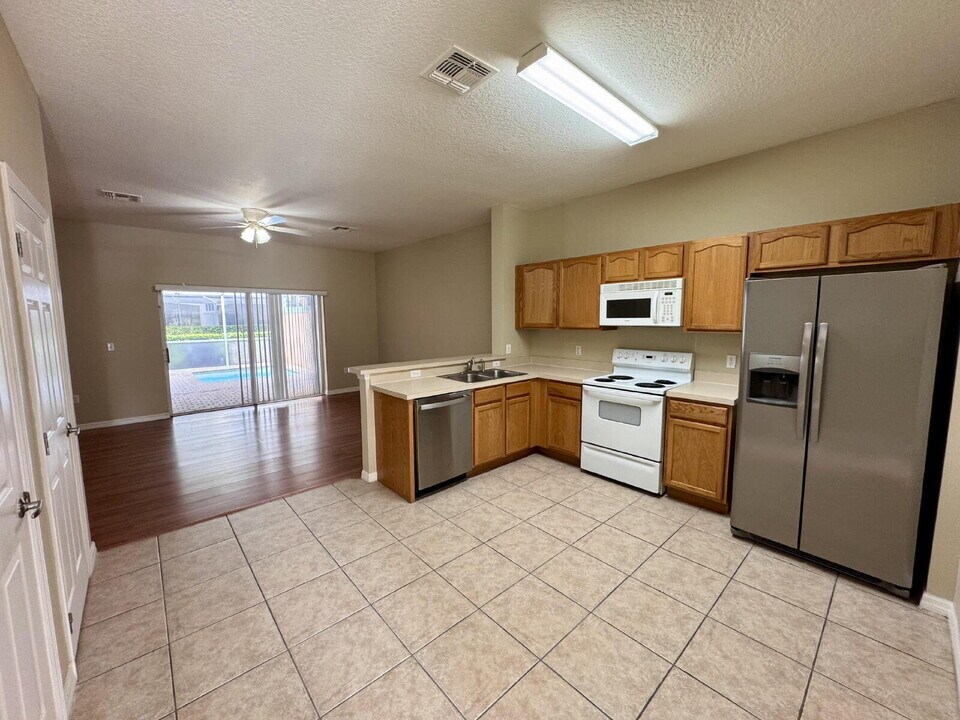 1413 Retreat Cir in Clermont, FL - Building Photo