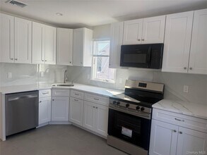 261 Wilson Ave in Westbury, NY - Building Photo - Building Photo