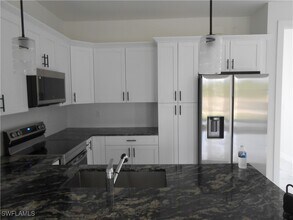 1145 Antonio St E in Lehigh Acres, FL - Building Photo - Building Photo