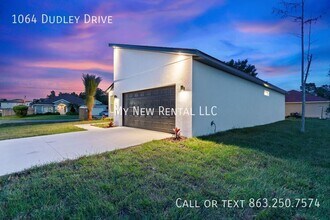 1064 Dudley Dr in Poinciana, FL - Building Photo - Building Photo