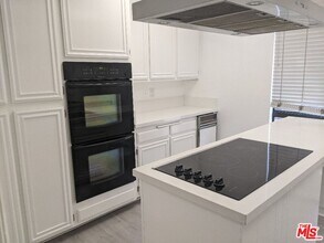 9191 Charleville Blvd-Unit -101 in Beverly Hills, CA - Building Photo - Building Photo