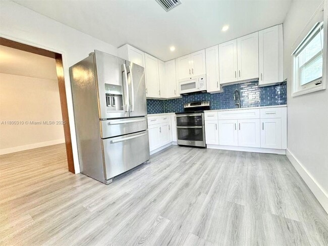 property at 3761 NW 1st St
