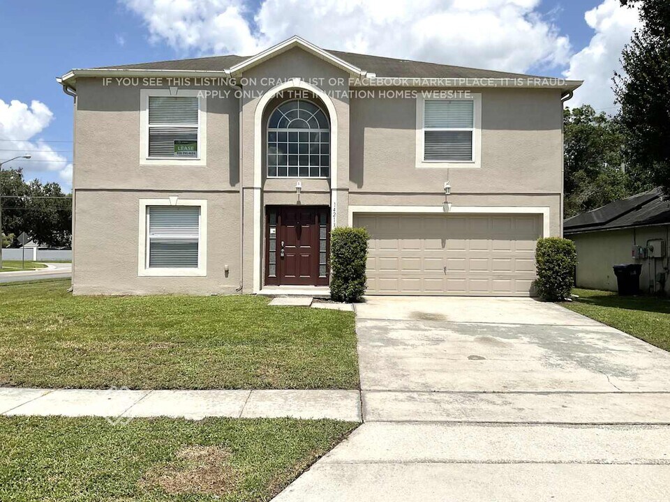 14213 Econ Woods Ln in Orlando, FL - Building Photo