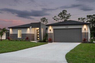 24489 SW Kingsway Cir in Lake Suzy, FL - Building Photo - Building Photo