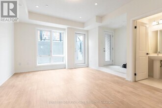 155-155 Tapscott Rd in Toronto, ON - Building Photo - Building Photo