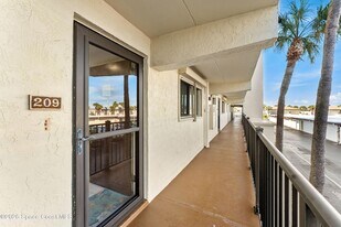 3060 N Atlantic Ave, Unit 209 in Cocoa Beach, FL - Building Photo