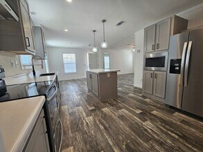 6661 Hidden Oaks Dr in North Fort Myers, FL - Building Photo - Building Photo