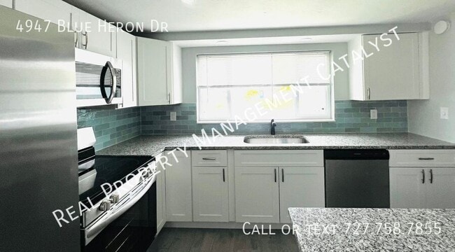 4947 Blue Heron Dr in New Port Richey, FL - Building Photo - Building Photo