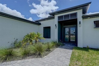 1227 NW 40th Pl in Cape Coral, FL - Foto de edificio - Building Photo