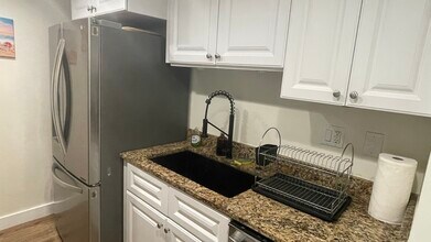 420 64th Ave, Unit Apt 1004 in St Pete Beach, FL - Building Photo - Building Photo