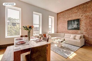 103 W 122nd St in New York, NY - Building Photo