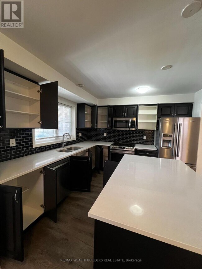 1260 Wintergreen Pl in Milton, ON - Building Photo - Building Photo