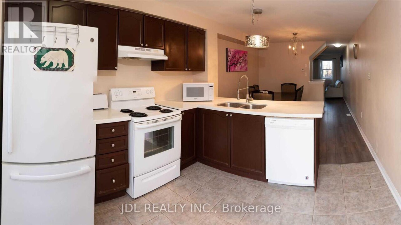 233 Rouge River Dr in Toronto, ON - Building Photo