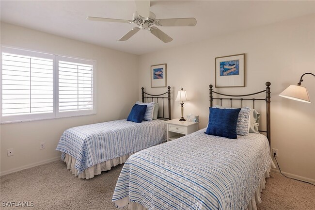 property at 7048 Pelican Bay Blvd