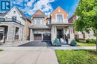 323 Harold Dent Trl in Oakville, ON - Building Photo