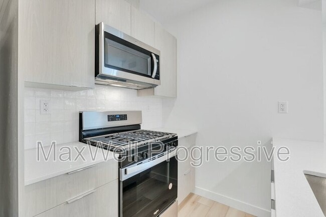 property at 7728-7105 105 Ave NW