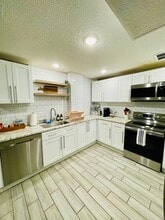 6980 Ruth Way, Unit Fully Furnished 2-Bedroom in Denver, CO - Foto de edificio - Building Photo