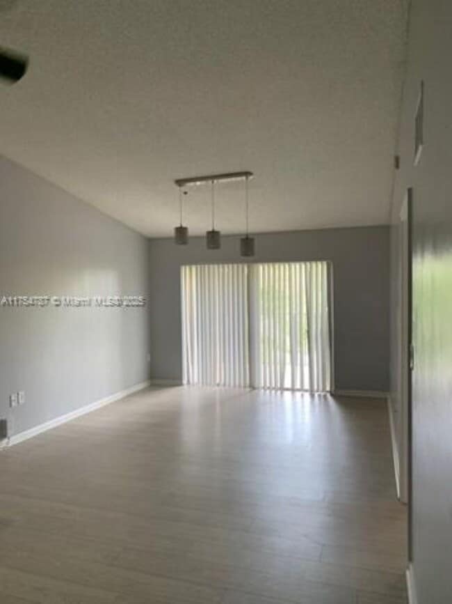 2061 Renaissance Blvd, Unit 303 in Miramar, FL - Building Photo - Building Photo