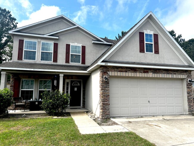 property at 118 Pine Bluff Blvd W