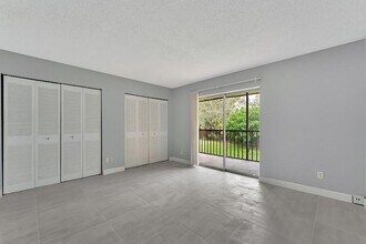 1430 Meadows Cir W, Unit 1430 in Boynton Beach, FL - Foto de edificio - Building Photo