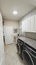 8761 Hinsdale Heights Dr in Polk City, FL - Building Photo - Building Photo