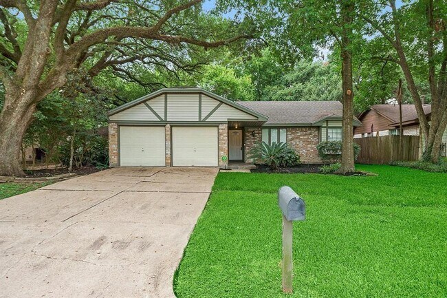 property at 9715 Lawngate Dr