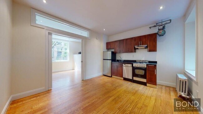 property at 207-209-209 W 11th St